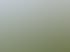 Grüne mobile Jagdkanzel auf Rädern und ein schwarzes Quad auf einem Grasberg mit Bäumen und Bergen im Hintergrund.