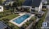 Bild von einem gebauten Pool mit Gartengestaltung
