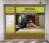 Werbeschild für "MASSAGE" mit Frau auf Massageliege, Website und Kontaktinformationen.