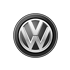 Rundes, silber-schwarzes Volkswagen-Logo mit stilisiertem "VW" in der Mitte auf grünem Hintergrund.