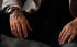 Manos de Eduardo Rodríguez García con tatuajes y anillos
