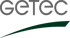 Grauer GETEC Schriftzug über einem geschwungenen grünen Balken auf schwarzem Hintergrund.