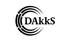 DAkkS-Logo mit schwarzem Schriftzug "DAkkS" und umgebenden Halbkreisen auf grünem Hintergrund.