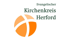 Logo des Evangelischen Kirchenkreises Herford mit orangefarbenem Kreis und weißem Kreuz.