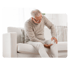 Older man holding knee, experiencing arthritis pain