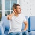Man holding neck for radiculopathy and pinched nerve relief