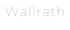 Logo: "Wallrath Bad & Fliesen Meisterbetrieb" in Weiß und Braun auf grünem Hintergrund.
