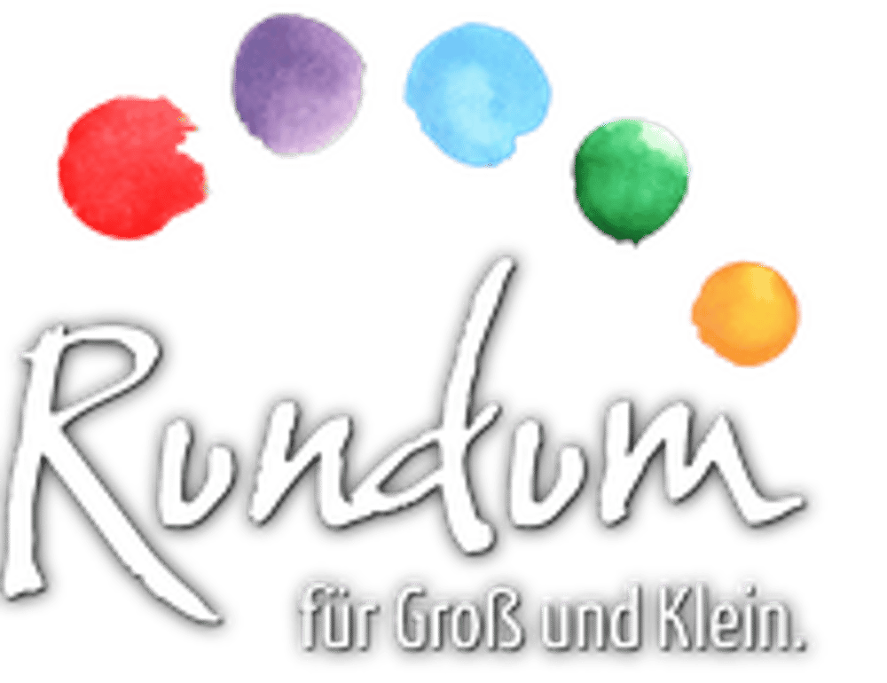 Logo "Rundum für Groß und Klein" mit fünf bunten, runden Farbklecksen in Rot, Lila, Blau, Grün, Orange.