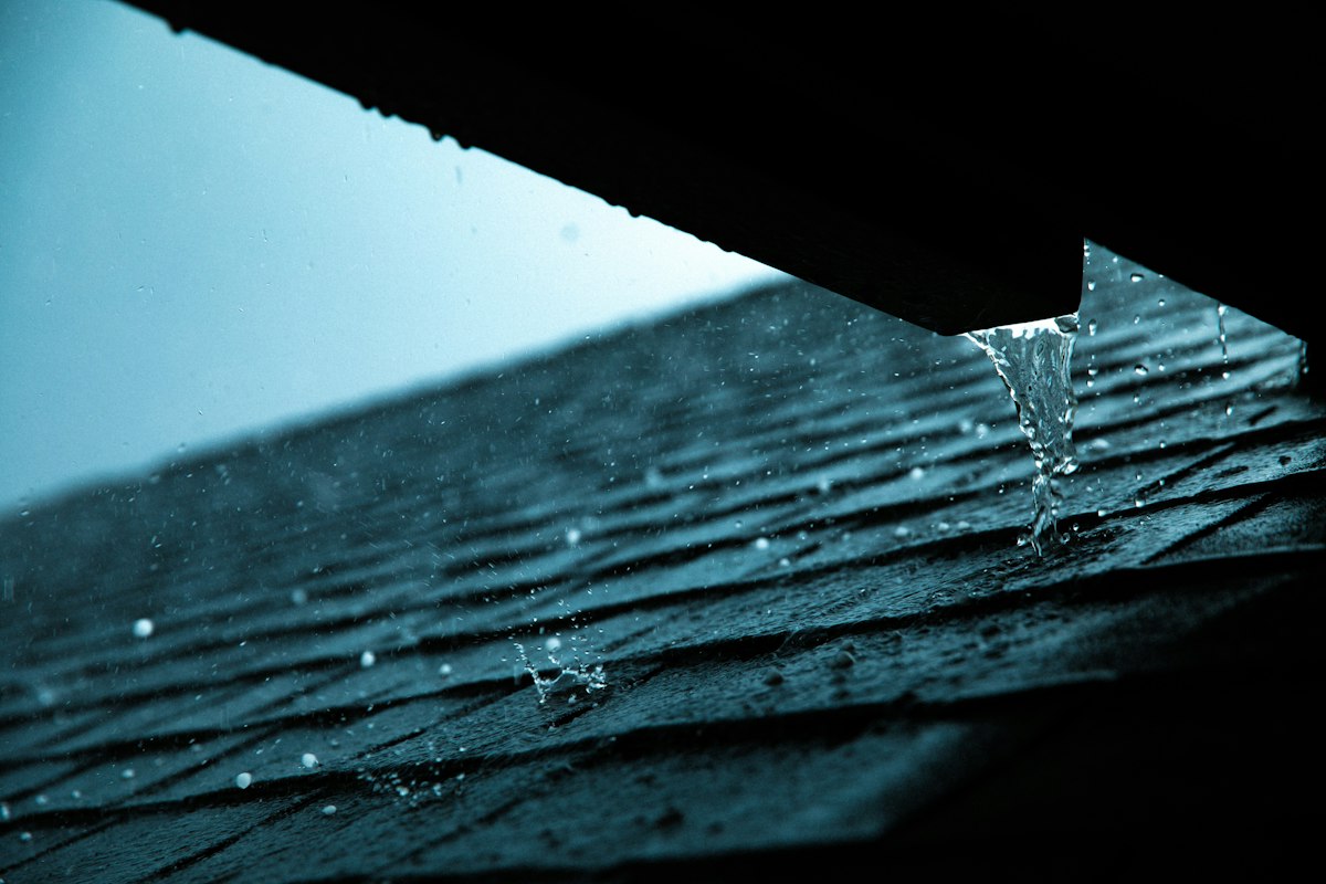 Close view of a roof edge, drip edge and gutter line