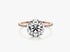 Verlobungsring aus Roségold mit einem großen runden Diamanten im Brillantschliff und diamantbesetzter Ringschiene.