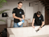 Professional upholstery cleaning service in the USA – two technicians deep clean a beige sofa using steam and eco-friendly solutions