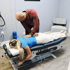 Chiropractor performing spinal adjustment on woman with herniated disc 






