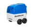 Blaue und weiße Dynabox 500 mit vier Rädern und Dynajet-Logo.