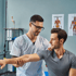 Chiropractor performing shoulder adjustment
