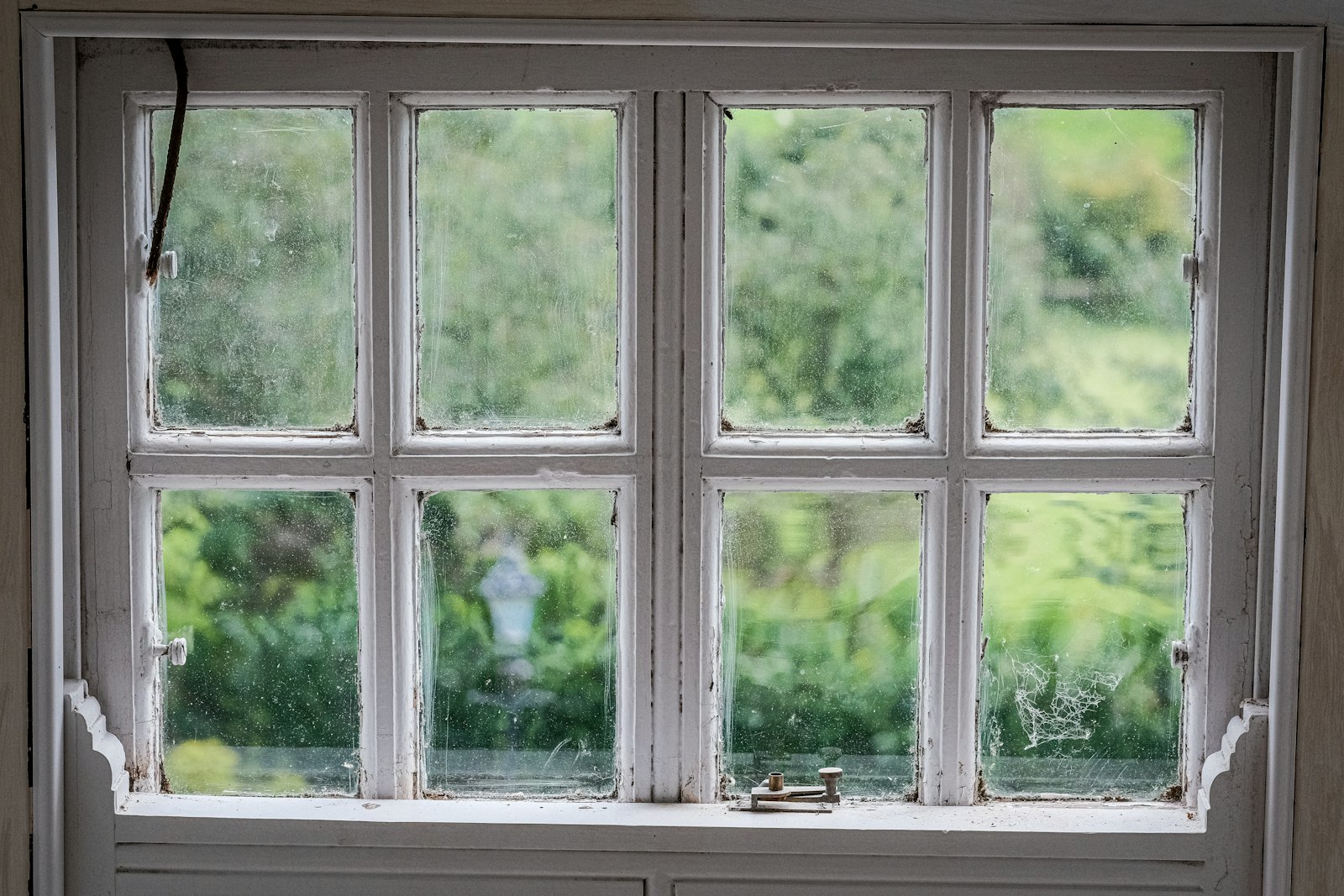 Close detail of a replacement window frame and pane