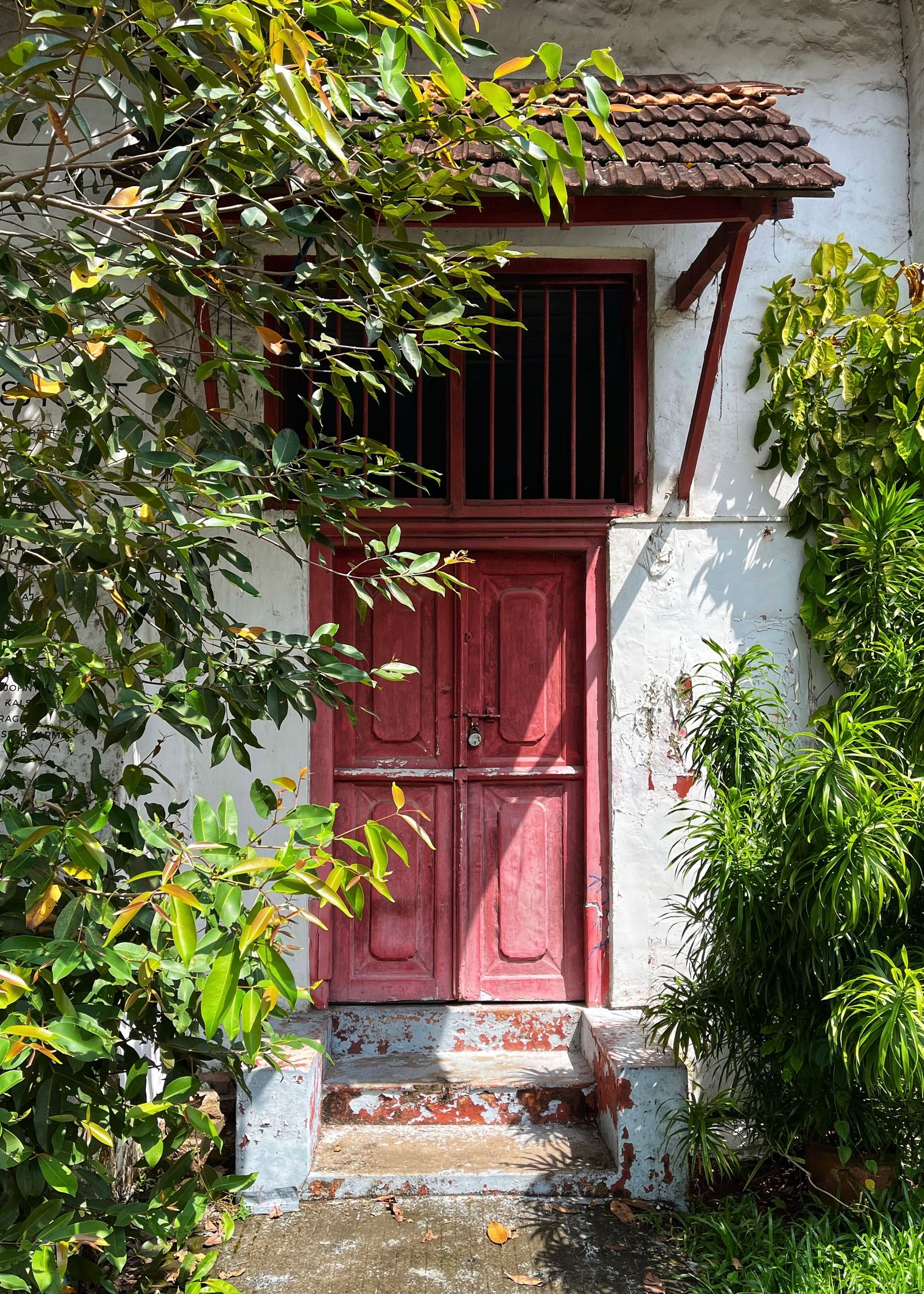 The front entry of a residential home protected by a monitored alarm system