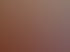 Flügel in einem Wohnzimmer mit Parkettboden, der mit einer rot-orange gestreiften Decke abgedeckt ist.