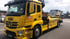 Gelber Mercedes-Benz Abschleppwagen mit "ADAC" und "HESS" Logos.