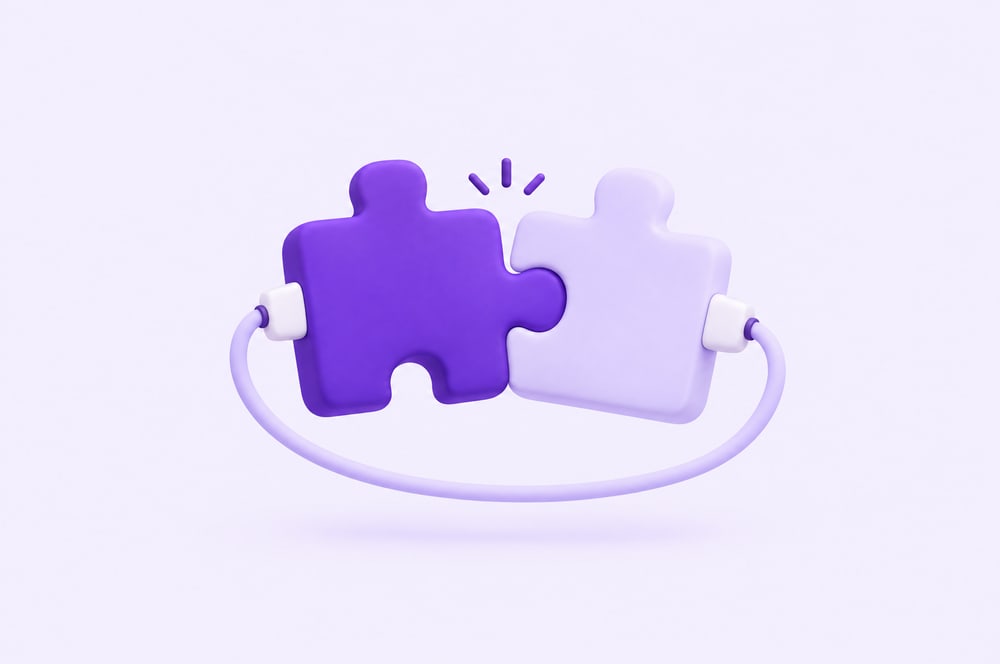 Illustration: zwei passende Puzzleteile mit Stecker und Kabel