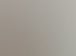 Schwarzes Klimagerät mit der Aufschrift „Daikin“ an einer beigen Wand.