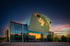 Festspielhaus St. Pölten bei der blauen Stunde mit beleuchteter Glasfassade fotografiert von Karin Maier