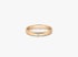 Ein schmaler Ring aus Roségold mit feiner Perlierung an den Rändern und einem kleinen, mittig gefassten Diamanten.