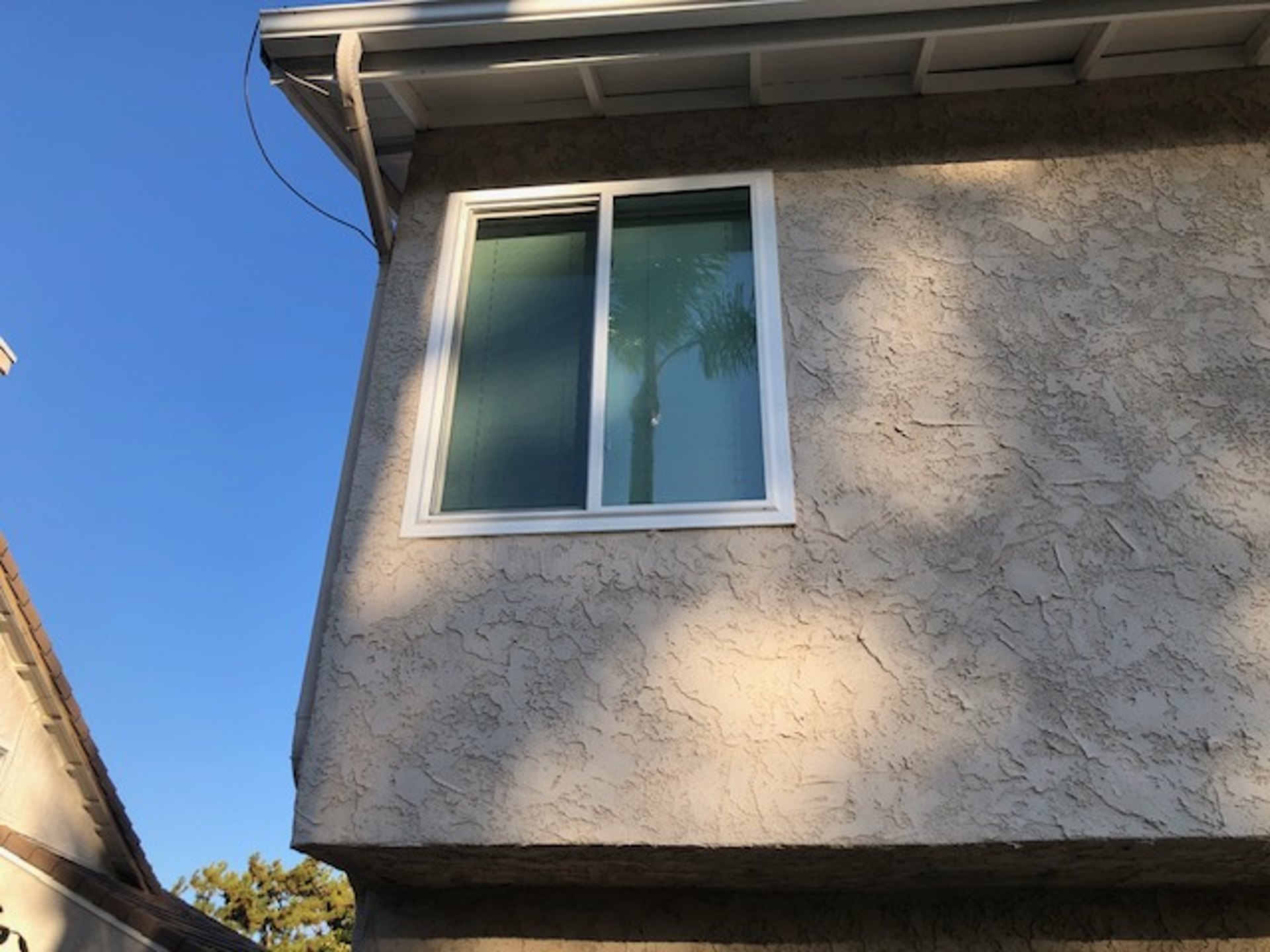 Bigelow style home with new vinyl windows replaced