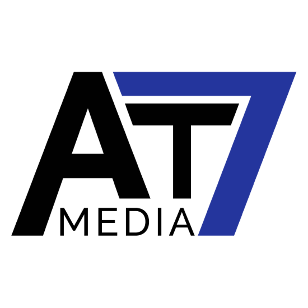 Weißes "AT MEDIA" Logo