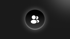 White group of people icon on a black, glowing circular button against a dark gray background.