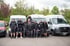 Team von Platzwerk Allgäu vor den eigenen Fahrzeugen