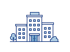 Modernes Bürogebäude mit blauen Fenstern und Türen, umgeben von zwei stilisierten Bäumen auf grünem Hintergrund - Krisenstab-Software Notfall- und Krisenmanager (NKM®).