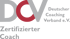 Logo des Deutschen Coaching Verbandes e.V. mit den Buchstaben DCV und dem Text „Zertifizierter Coach“.