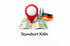 Roter Standort-Pin auf Karte mit Kölner Dom und Deutschlandflagge; Text: Standort Köln.