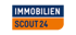 Logo von ImmobilienScout24 mit weißer Schrift auf blauem und orangefarbenem Hintergrund.