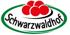 Logo der Marke Schwarzwaldhof mit fünf roten Bollenhut-Kugeln in einem grün-weißen Oval.
