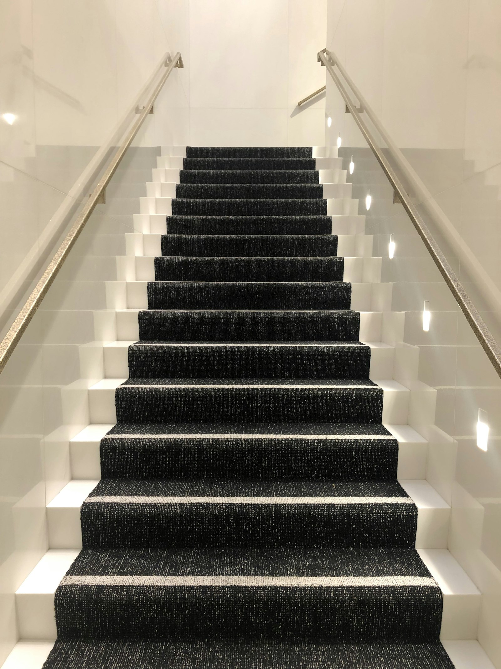 Freshly installed carpet running up a residential staircase