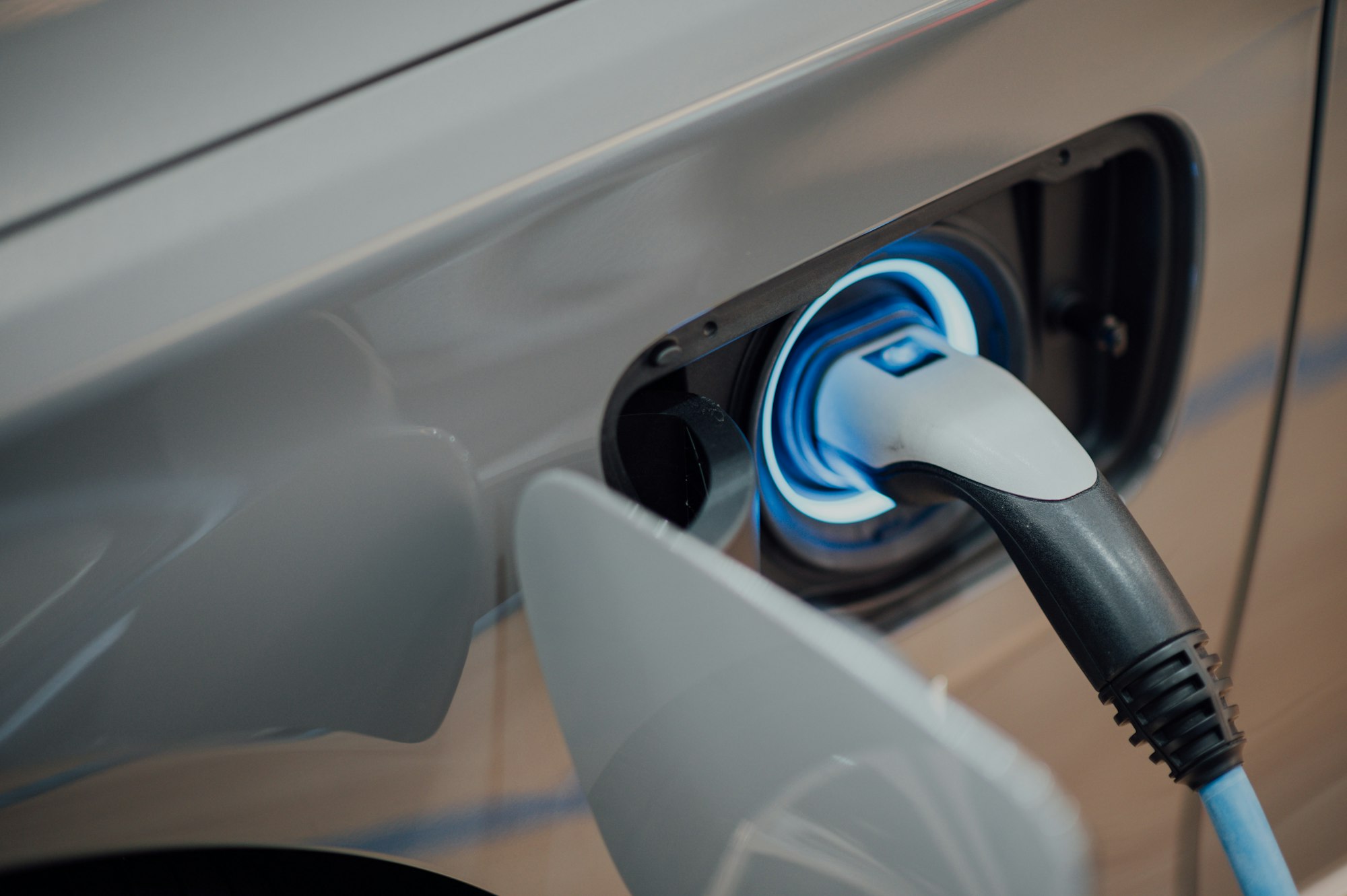 Electric vehicle plugged into a Level 2 EV charger
