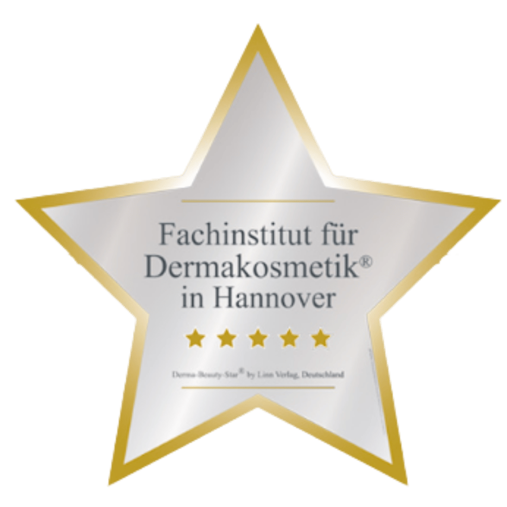 Silberner Stern mit goldener Umrandung, Aufschrift "Fachinstitut für Dermakosmetik® in Hannover", 5 goldene Sterne.