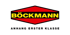 Böckmann Logo mit gelbem Schriftzug auf rotem rautenförmigem Hintergrund und "ANHANG ERSTER KLASSE" darunter.
