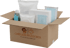 Brauner Karton mit der Aufschrift „CARELION PFLEGEBOX – PFLEGE DIE DICH ERREICHT“ gefüllt mit Hygieneartikeln.