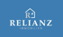 Logo: Weißes Haus mit "R", darunter "RELIANZ IMMOBILIEN" auf blauem Hintergrund.