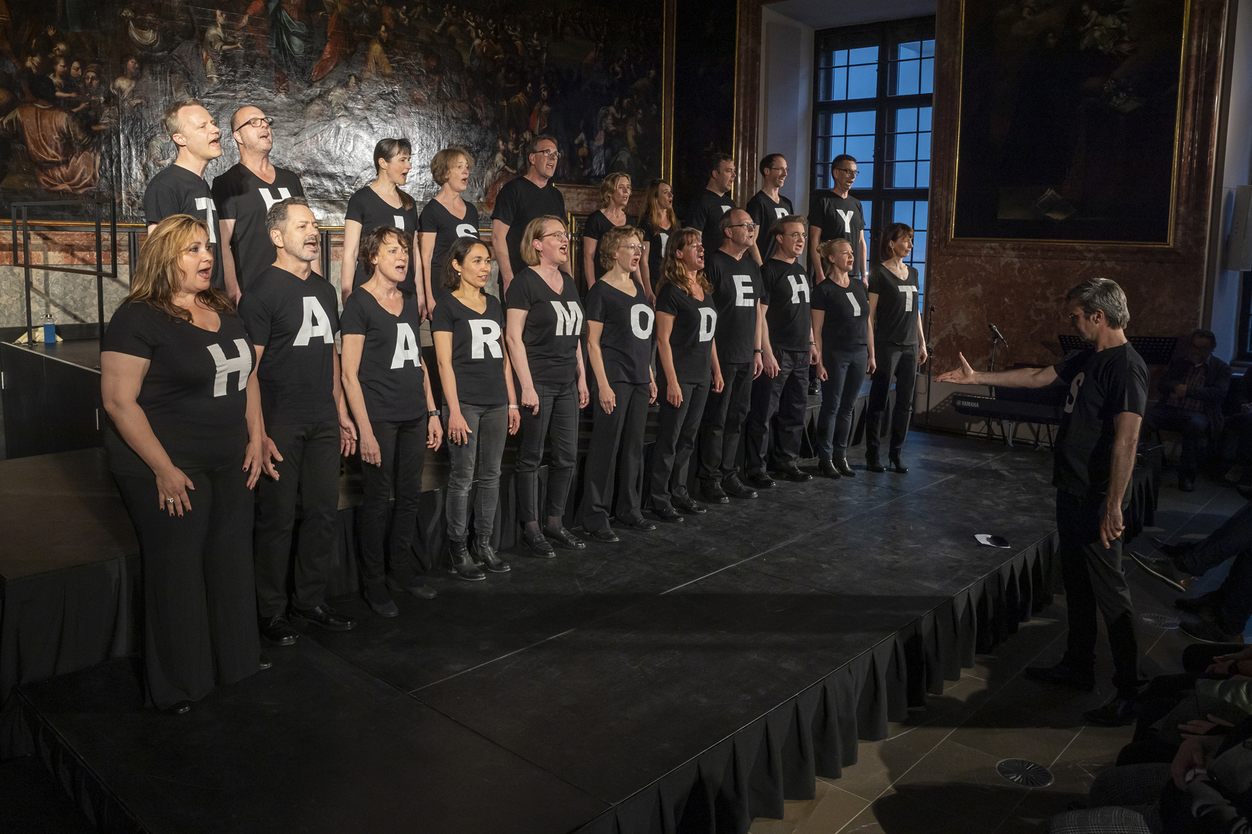 The Happy Disharmonists on stage in the Minoritensaal, Voices of Spirit 2023