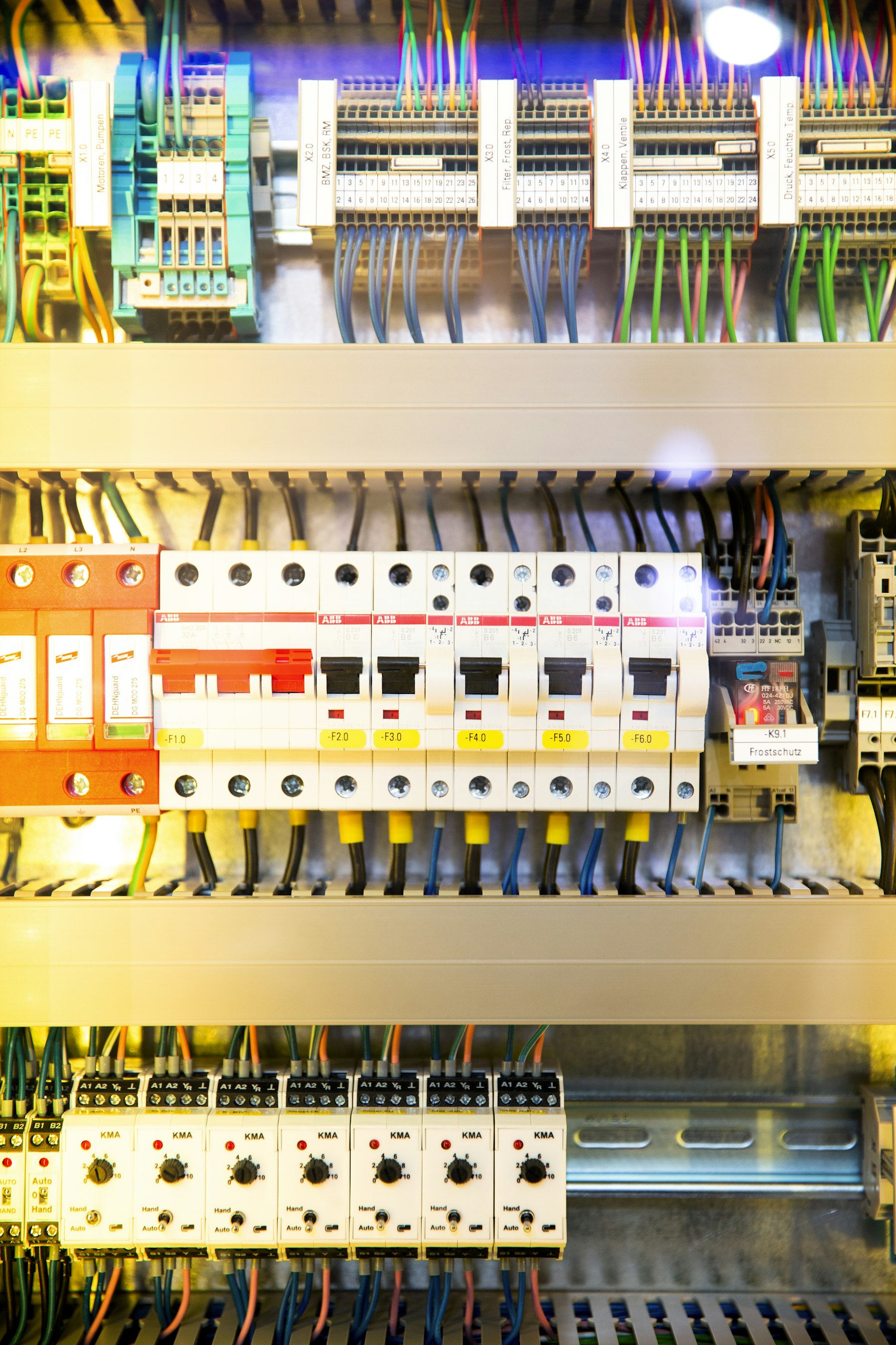 Open electrical panel during an EV charger circuit installation in Yorba Linda