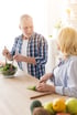 Elderly man and woman cooking together, showcasing advantages of Semax peptide