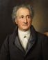 Porträt von Johann Wolfgang von Goethe mit grauen Locken, weißem Hemd und dunklem Mantel.