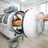Hyperbaric oxygen therapy inside a pressurized chamber 