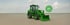 Grüner Radlader auf Asphalt mit einem grünen Kreis, der "Bis zu 55% Förderung" anzeigt.