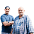 Ein lächelnder Mann mit Bart und blauer Kappe, der eine blaue Weste mit „GBK“-Logo und einen Kapuzenpullover trägt.