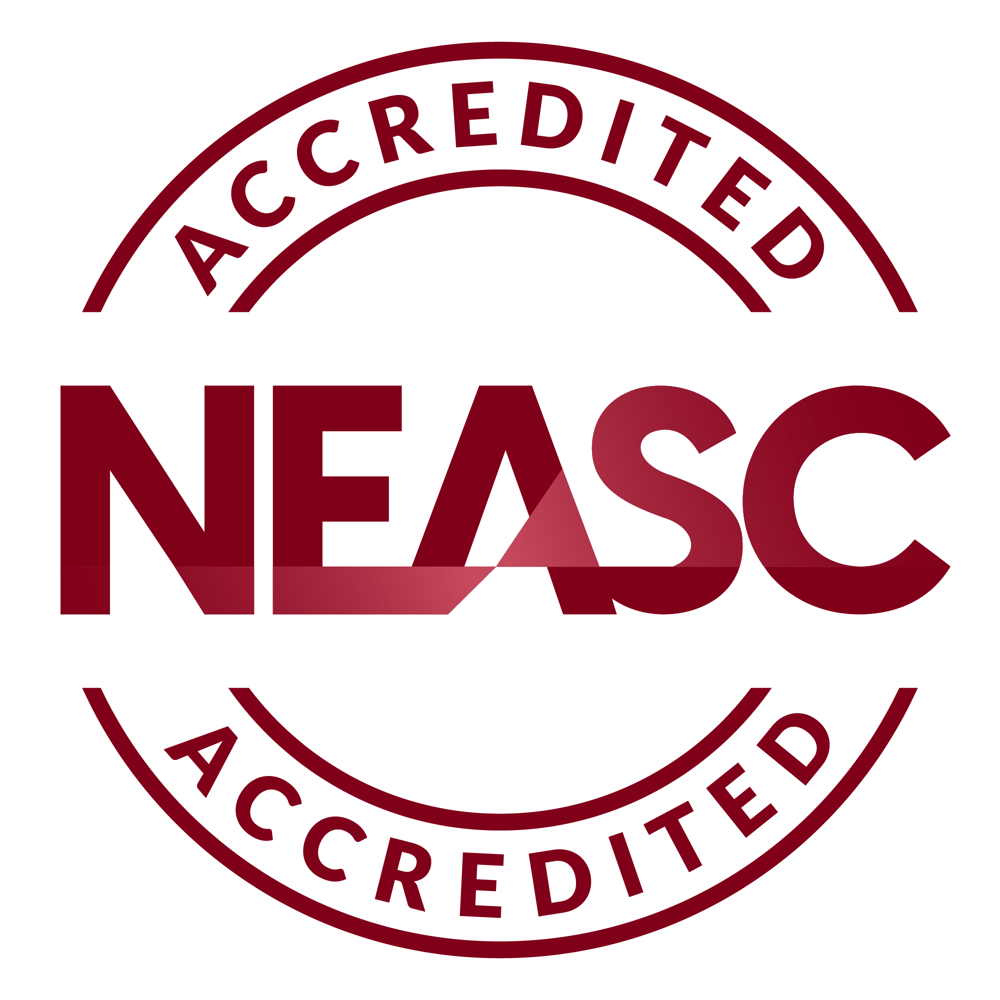 NEASC Accredited logo with "NEASC" in a stylized, multi-line font and "Accredited" below in a simpler font.