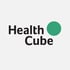 Health Cube Logo mit schwarzem Text und grünem Kreis.